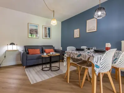 Coin salon dans l'établissement Apartment Ermitage-5 by Interhome