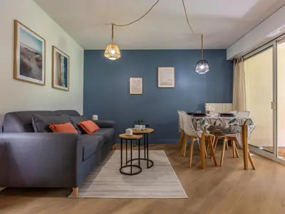 Coin salon dans l'établissement Apartment Ermitage-5 by Interhome