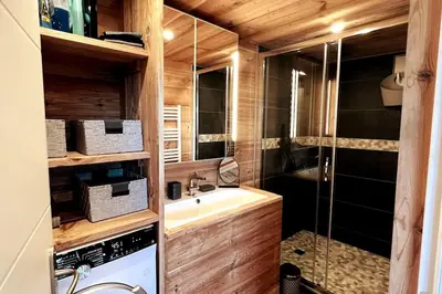 Cuisine ou kitchenette dans l'établissement Chalet et Jaccuzy sur la plage
