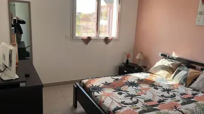 Un ou plusieurs lits dans un hébergement de l'établissement Appartement La Villa Gayrou