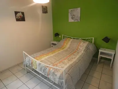 Un ou plusieurs lits dans un hébergement de l'établissement Gite de spalette