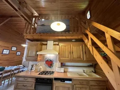 Cuisine ou kitchenette dans l'établissement Chalet des dunes