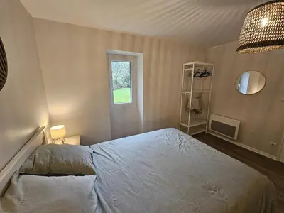 Un ou plusieurs lits dans un hébergement de l'établissement Maison perouge