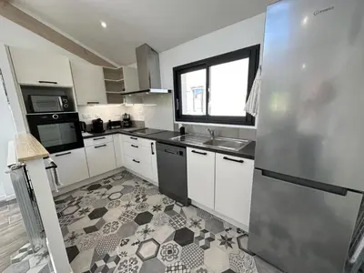 Cuisine ou kitchenette dans l'établissement La maison poulet