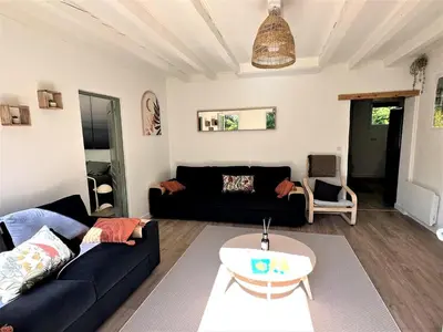 Coin salon dans l'établissement Maison perouge 2