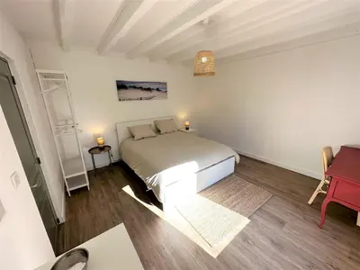 Un ou plusieurs lits dans un hébergement de l'établissement Maison perouge 2