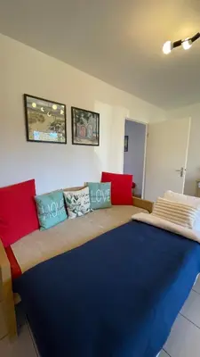 Un ou plusieurs lits dans un hébergement de l'établissement Chalet paisible à la plage, piscine et tennis