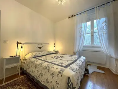 Un ou plusieurs lits dans un hébergement de l'établissement Le balcon des thermes