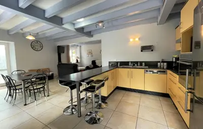 Cuisine ou kitchenette dans l'établissement Hourquet