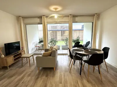 Télévision ou salle de divertissement dans l'établissement L'appartement de l'ermitage