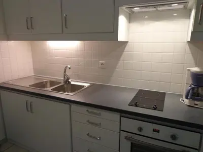 Cuisine ou kitchenette dans l'établissement Arbousiers