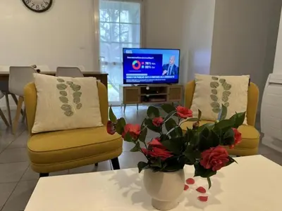 Télévision ou salle de divertissement dans l'établissement L'etable