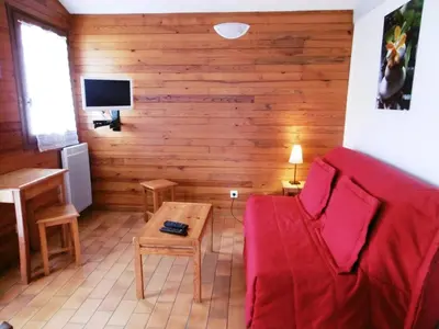 Télévision ou salle de divertissement dans l'établissement Les aubepines