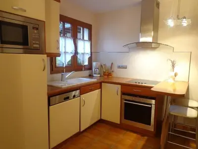 Cuisine ou kitchenette dans l'établissement Le clos fleuri