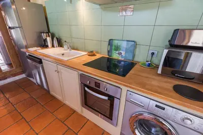 Cuisine ou kitchenette dans l'établissement Safranerio