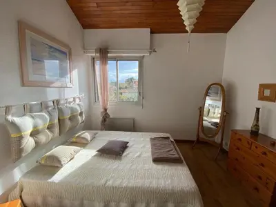 Un ou plusieurs lits dans un hébergement de l'établissement Villa patio à Capbreton, proche du centre - FR-1-413-229