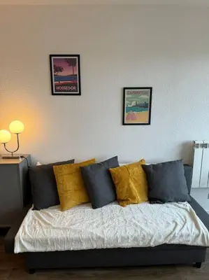Un ou plusieurs lits dans un hébergement de l'établissement Cap Ocean Appartement T2 cosy avec balcon à 1 min de l'océan