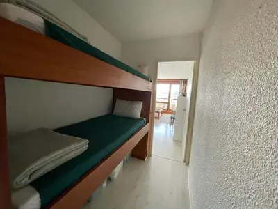 Un ou plusieurs lits dans un hébergement de l'établissement Appartement rénové pour 4 pers avec piscine à Capbreton - FR-1-413-230