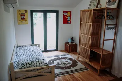 Un ou plusieurs lits dans un hébergement de l'établissement Maison Typique Landaise