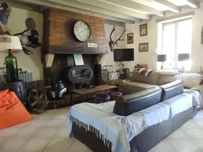 Coin salon dans l'établissement ENTRE CHEVREUIL ET CERF