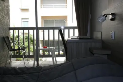 Balcon ou terrasse dans l'établissement Hôtel Le Relais Dax