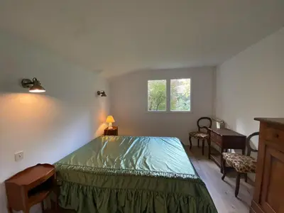 Un ou plusieurs lits dans un hébergement de l'établissement Grande maison landaise près du port de Capbreton, 4 chambres, jardin, animaux admis - FR-1-413-232