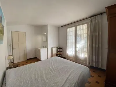 Un ou plusieurs lits dans un hébergement de l'établissement Grande maison landaise près du port de Capbreton, 4 chambres, jardin, animaux admis - FR-1-413-232