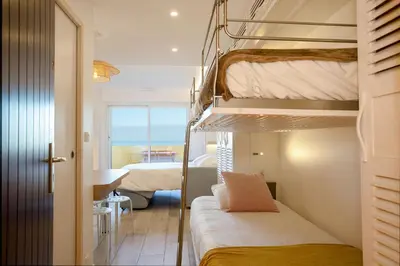 Un ou plusieurs lits dans un hébergement de l'établissement Atlantic Selection - La Parenthèse de Capbreton - Vue océan, plage Notre-Dame