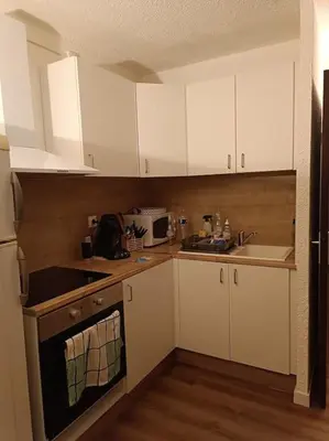 Cuisine ou kitchenette dans l'établissement Appartement T2, proche de la mer