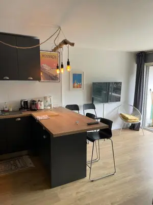 Cuisine ou kitchenette dans l'établissement Tao Le Sporting