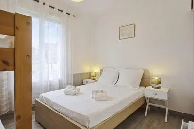 Un ou plusieurs lits dans un hébergement de l'établissement La Maison Alouette - Welkeys