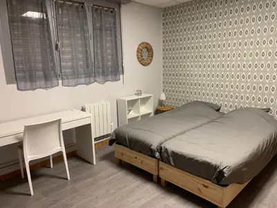Un ou plusieurs lits dans un hébergement de l'établissement Centre de vacances Hotel CAPLANDES