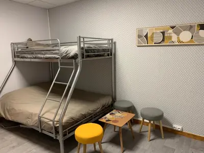 Un ou plusieurs lits dans un hébergement de l'établissement Centre de vacances Hotel CAPLANDES
