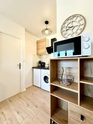 Cuisine ou kitchenette dans l'établissement Le Clémenceau - Parking Privé - Fibre & Clim
