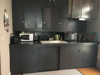 Cuisine ou kitchenette dans l'établissement logement privé centre Hossegor jardin parking