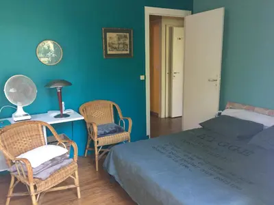 Un ou plusieurs lits dans un hébergement de l'établissement logement privé centre Hossegor jardin parking