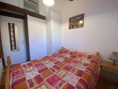 Un ou plusieurs lits dans un hébergement de l'établissement Villa patio cosy à Capbreton, proche port et centre, avec grande terrasse et parking privé - FR-1-413-233