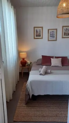Un ou plusieurs lits dans un hébergement de l'établissement Maison Du Lac.