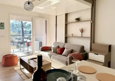 Coin salon dans l'établissement Biscawaï studio spacieux et cosy