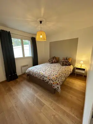 Un ou plusieurs lits dans un hébergement de l'établissement VILLA LAUNA GUJAN