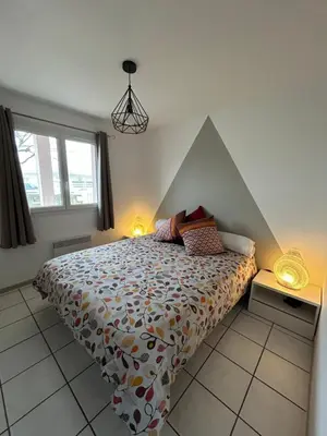 Un ou plusieurs lits dans un hébergement de l'établissement VILLA LAUNA GUJAN
