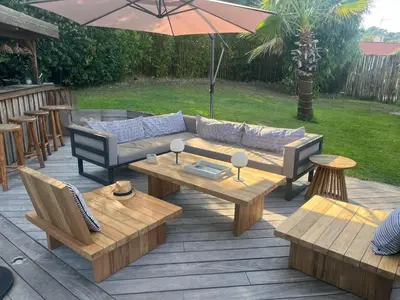 Coin salon dans l'établissement Villa proche Golf d'Arcachon avec piscine chauffée