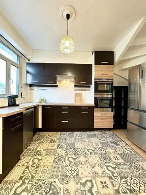 Cuisine ou kitchenette dans l'établissement L'Évasion - Centre-Ville & Garage Privé