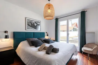 Un ou plusieurs lits dans un hébergement de l'établissement Villa Terrama Capbreton