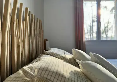 Un ou plusieurs lits dans un hébergement de l'établissement Douce Évasion