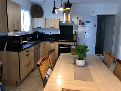 Cuisine ou kitchenette dans l'établissement L’aureilhannaise