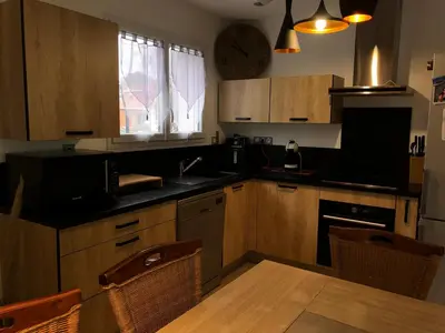 Cuisine ou kitchenette dans l'établissement L’aureilhannaise