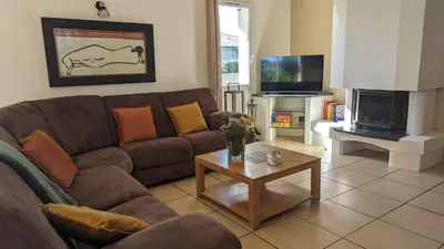 Télévision ou salle de divertissement dans l'établissement Villa Naturéa
