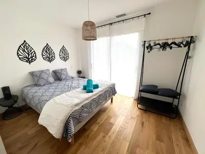 Un ou plusieurs lits dans un hébergement de l'établissement VILLA CANTATE - Maison avec piscine