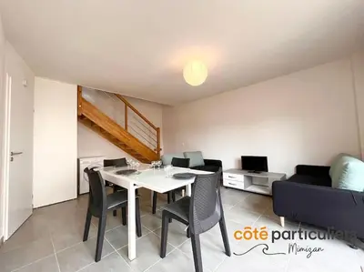Coin salon dans l'établissement Au Soleil Couchant - Apt T3 à 800m de l'Océan